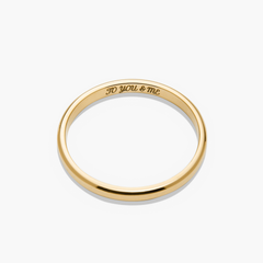 2mm Smooth Band: A handcrafted, engraved 14k gold ring with streamlined edges, symbolizing an unbreakable bond. Ideal for stacking or as a standalone piece.