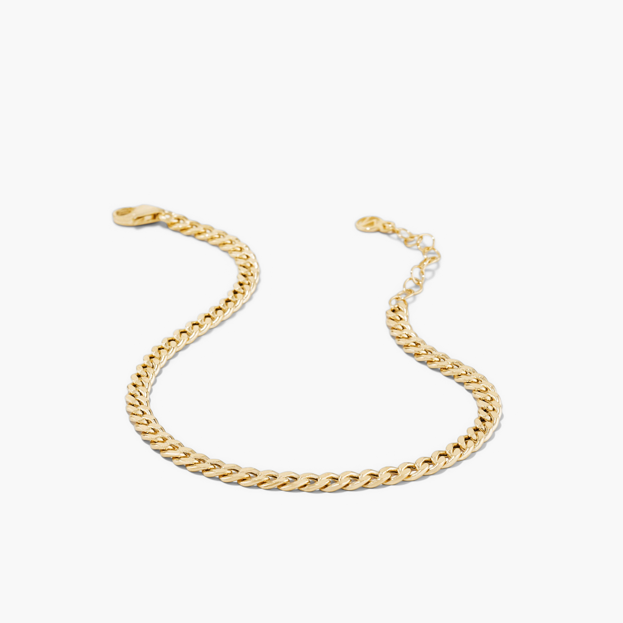 Curb Bracelet: Handcrafted 14k gold chain, durable for daily wear, versatile alone or layered.