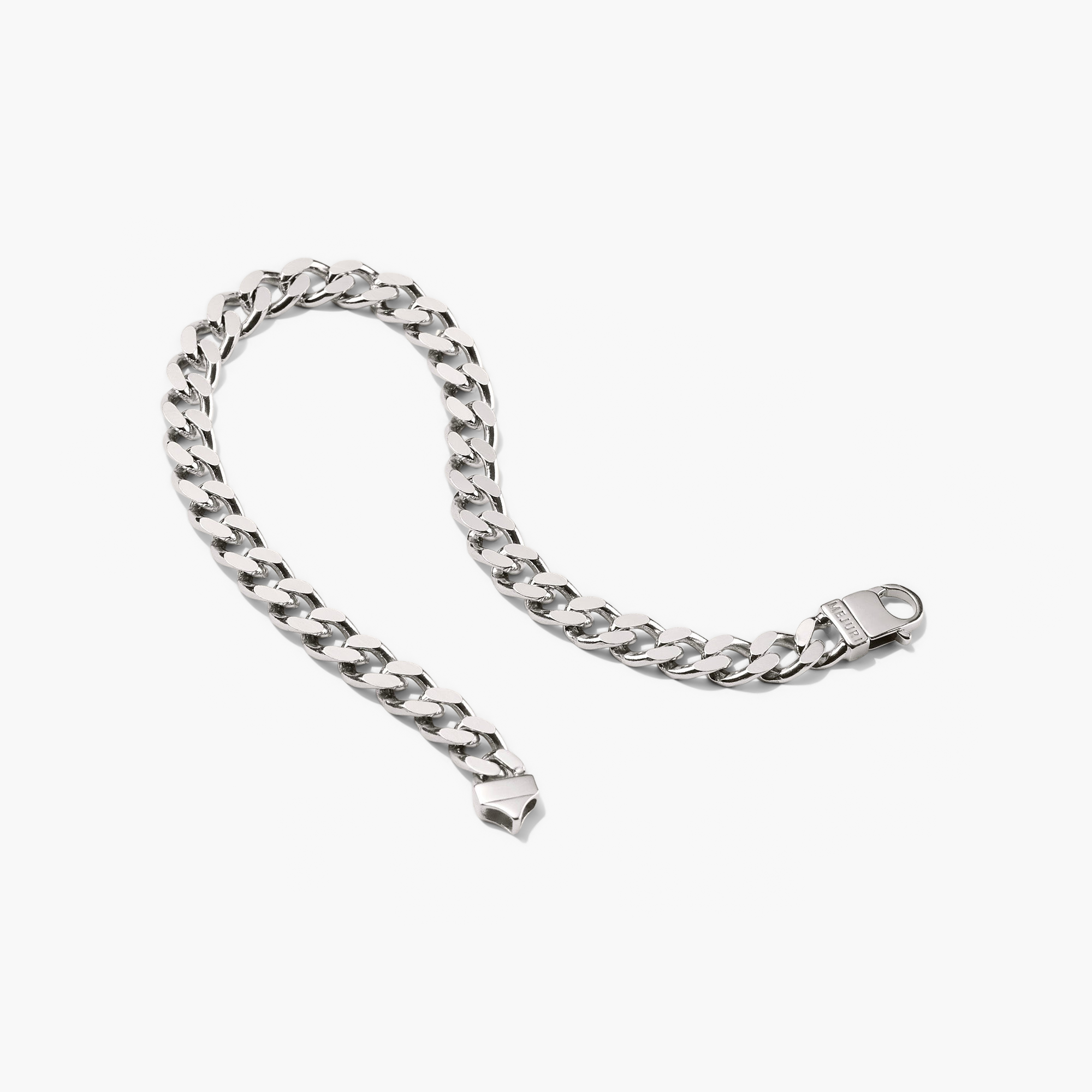 Curb Chain Bracelet: A silver chain bracelet designed for everyday wear, either styled solo or doubled up for a statement look.