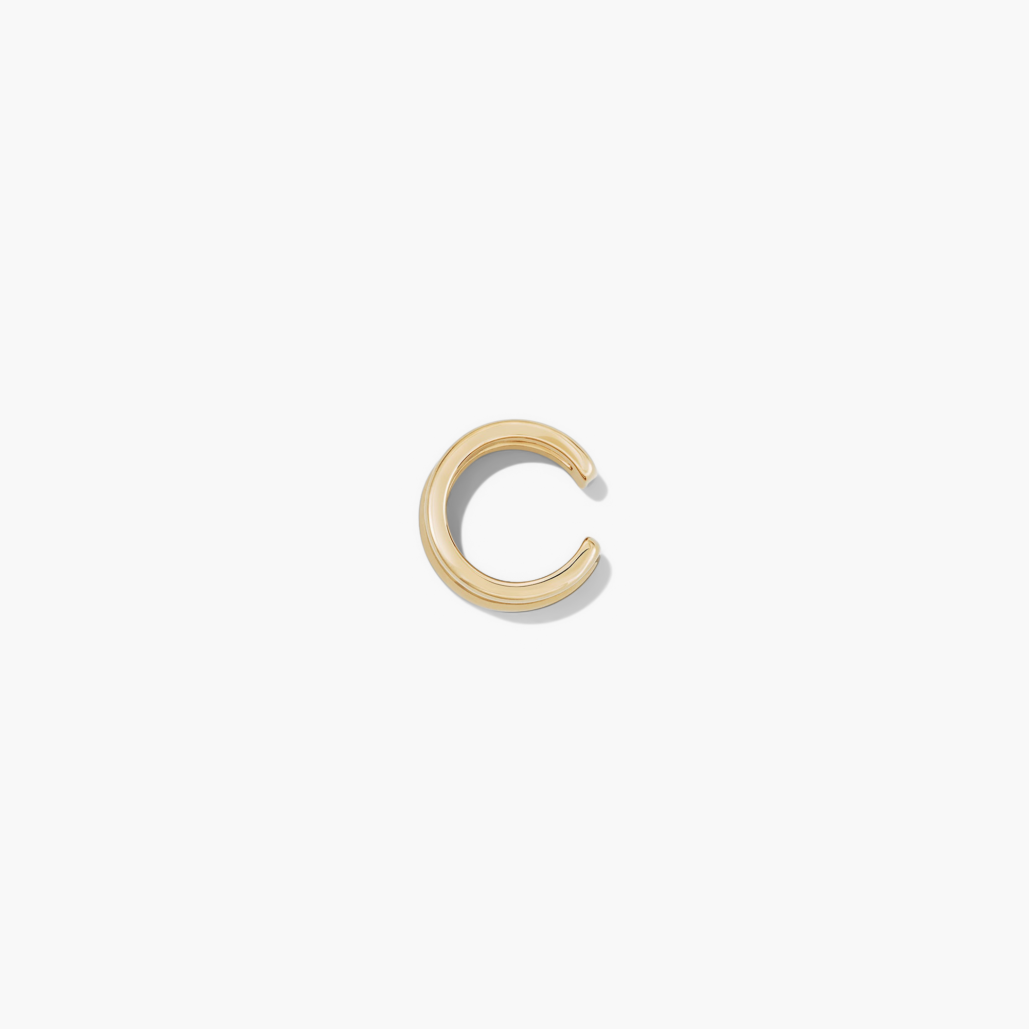 Duet Ear Cuff: a handcrafted, gold vermeil ear cuff with a hollow interior for comfort.