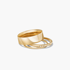 Daily Stacker Ring: A stack of elegant gold rings, showcasing their sleek design, perfect for layering as a stylish fashion accessory.