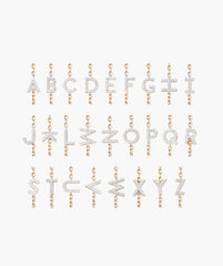 Diamond Letter Bracelet featuring 26 yellow gold pendants A-Z, each pavÃ©-studded with diamonds, hanging vertically from a gold chain, handcrafted in 14k solid gold.