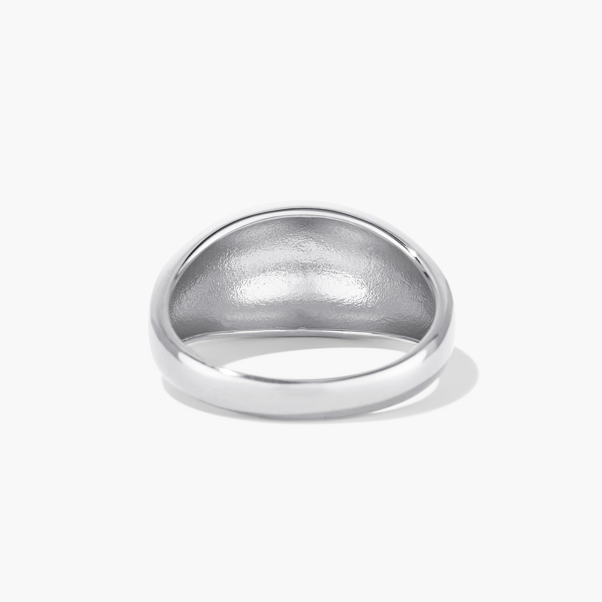 Silver DÃ´me Ring with a circular center, ideal for stacking with daintier rings, showcasing a classic yet bold design.