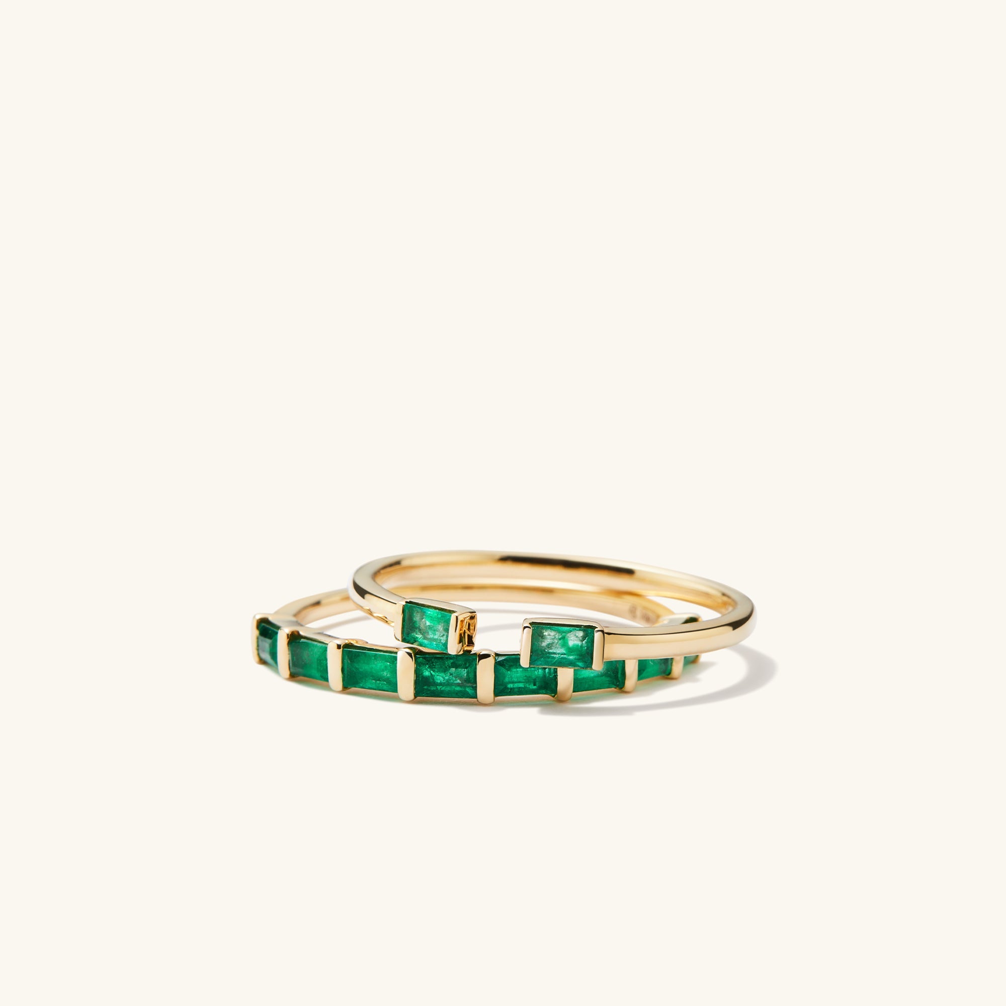 Baguette Emerald Open Ring in 14k gold with tapered, handcrafted emerald stones, featuring unique inclusions for distinct character.