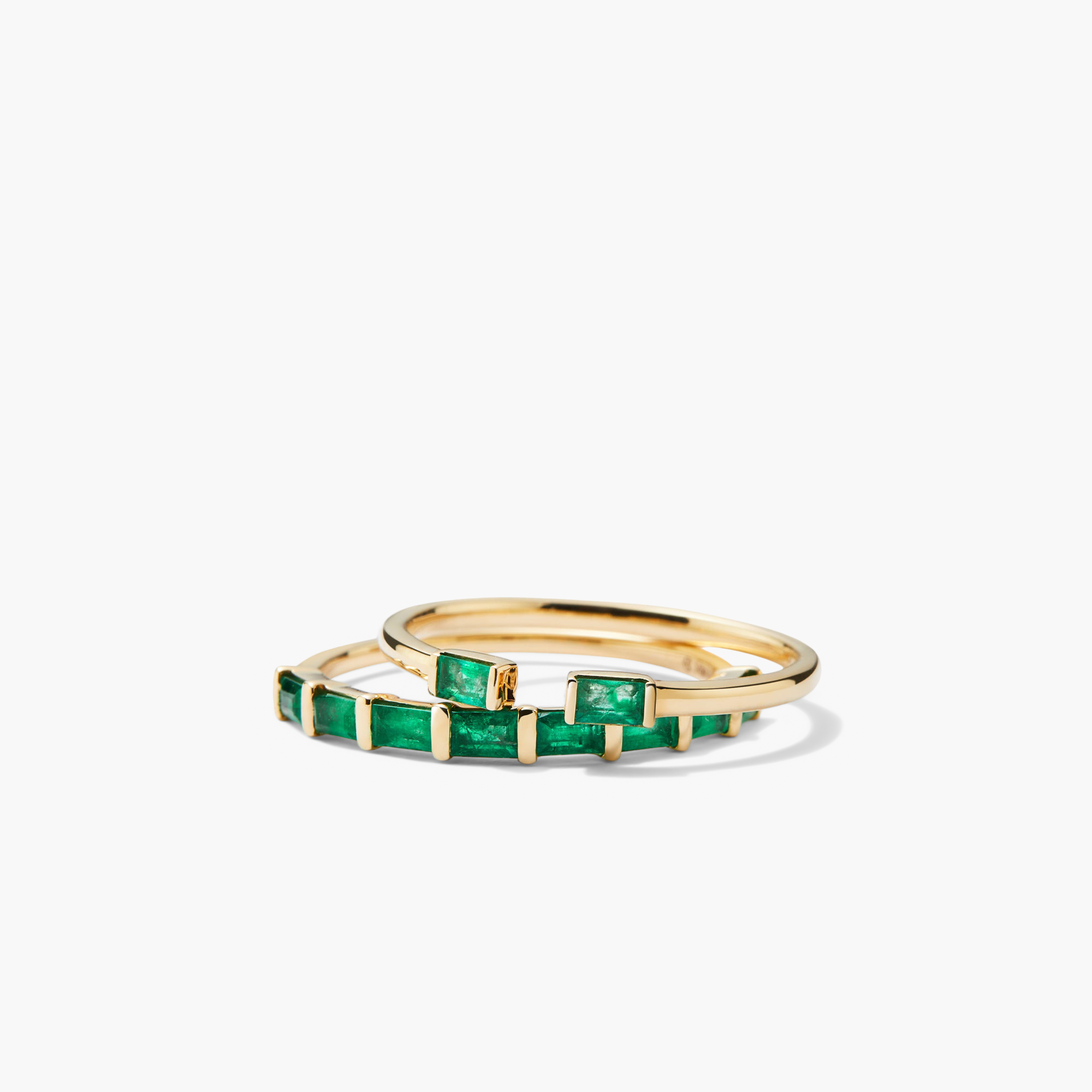 Baguette Emerald Open Ring in 14k gold with tapered, handcrafted emerald stones, featuring unique inclusions for distinct character.