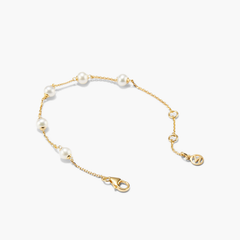 Mini Pearl Satellite Bracelet featuring freshwater pearls on a delicate gold vermeil chain.