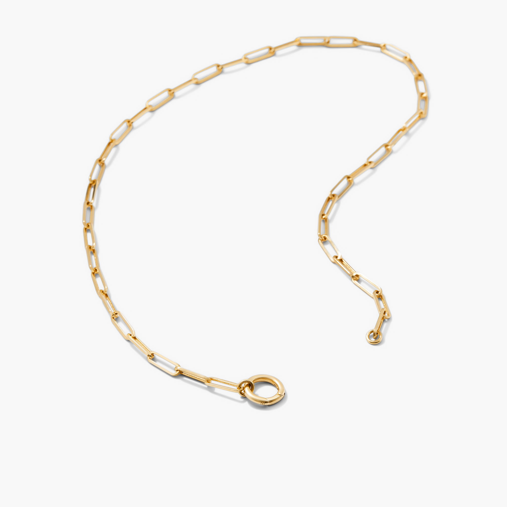 Paperclip Chain Charm Necklace with a central hole, designed to layer multiple charms, handcrafted in 14k recycled solid gold.