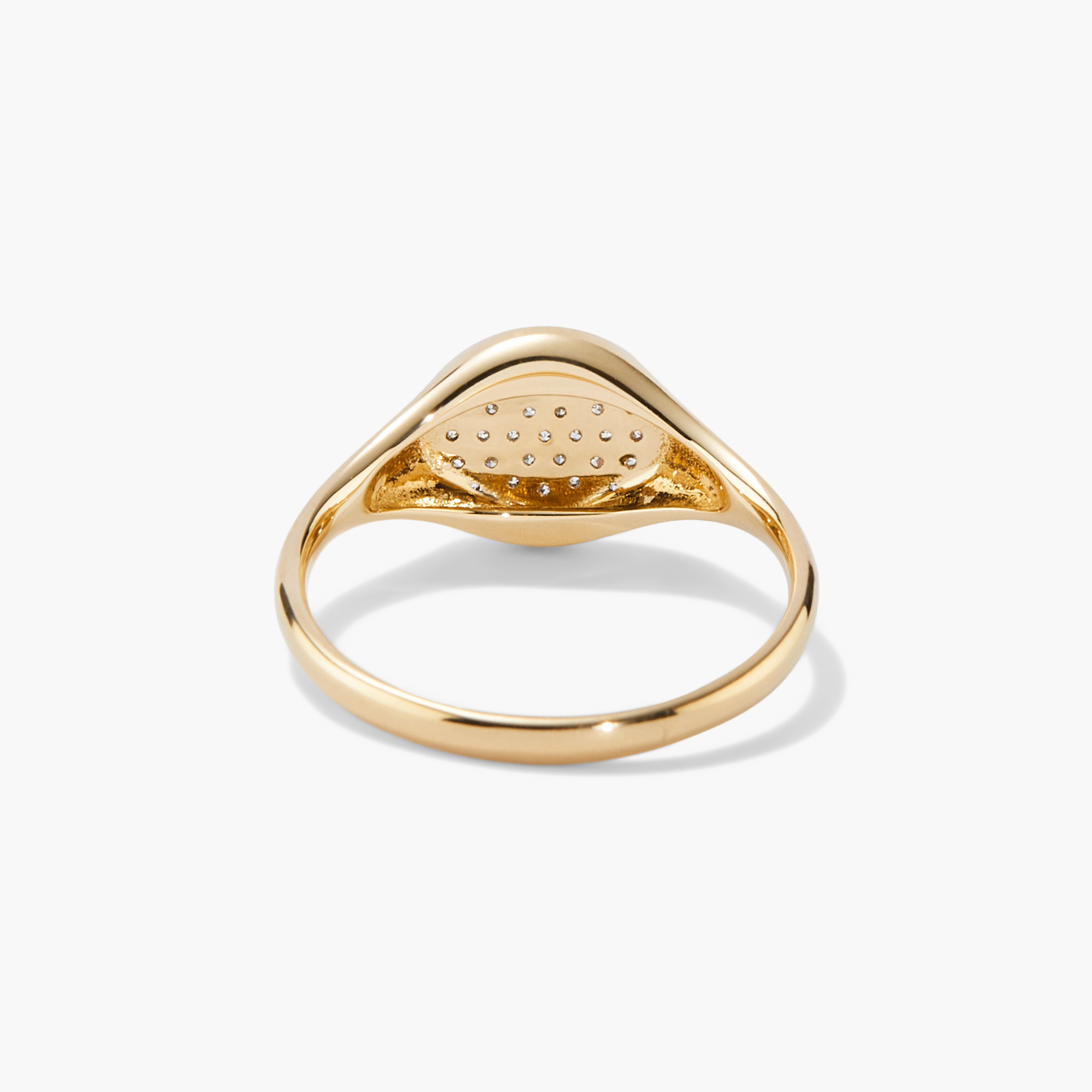 PavÃ© Diamond Signet Pinky Ring featuring a central diamond surrounded by pavÃ©-set diamonds, showcasing a refined and elegant fashion accessory.
