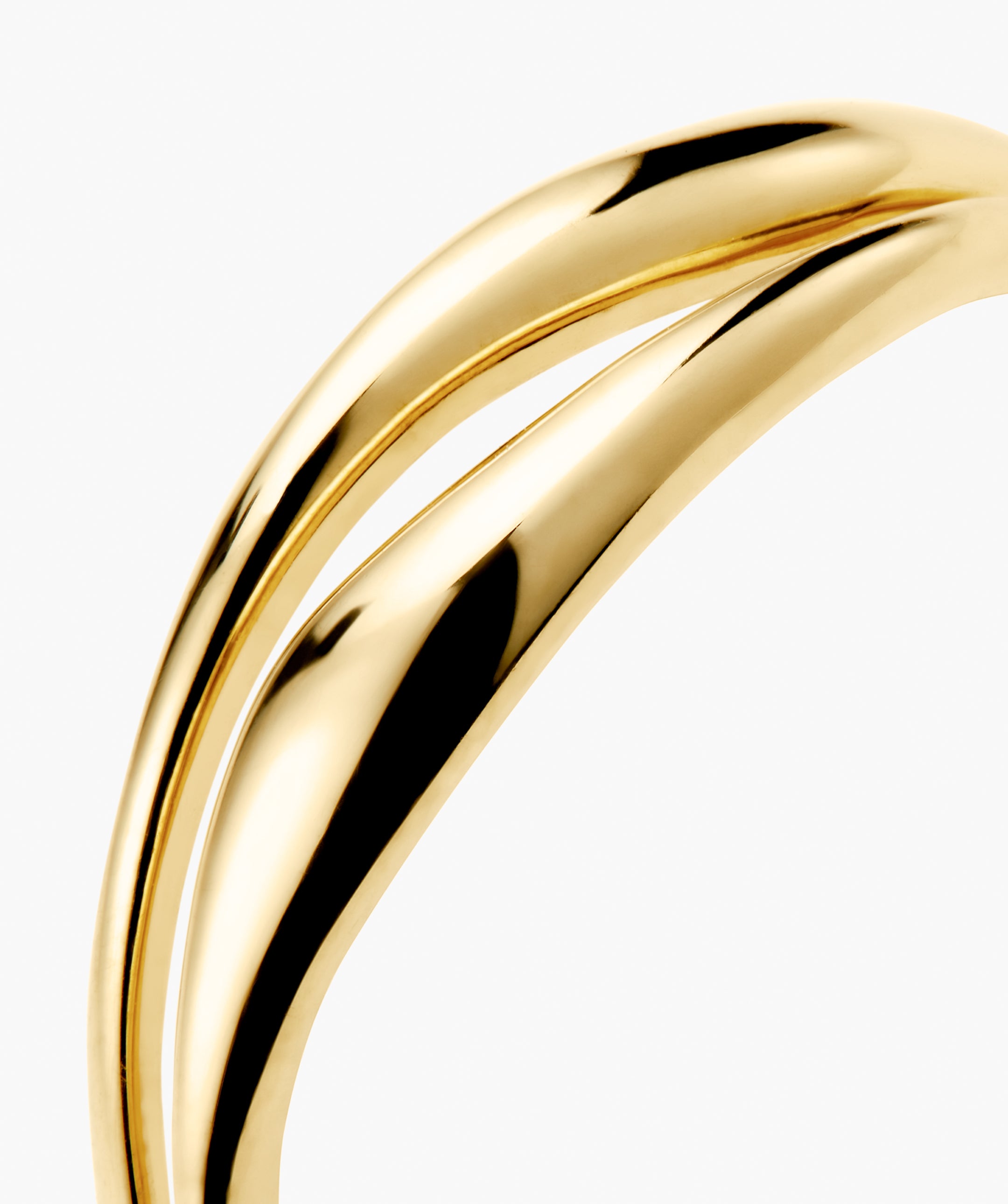 Open DÃ´me Ring featuring smooth, polished gold-colored tubular arcs, showcasing sleek, interlocking curves, responsibly sourced to support habitat restoration for wildlife.