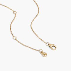Hue Necklace: 14k solid gold chain with a clasp, featuring genuine white topaz gemstones. Handcrafted for a subtle, versatile statement.