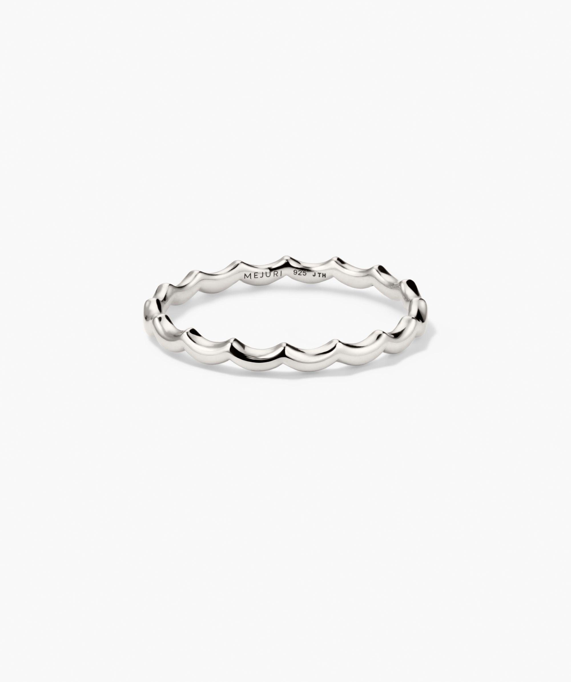 Slim Charlotte Stacker Set features a scalloped sterling-silver band, engraved MEJURI 925, and adorned with lab-grown sapphire accents for an edgy stacking style.