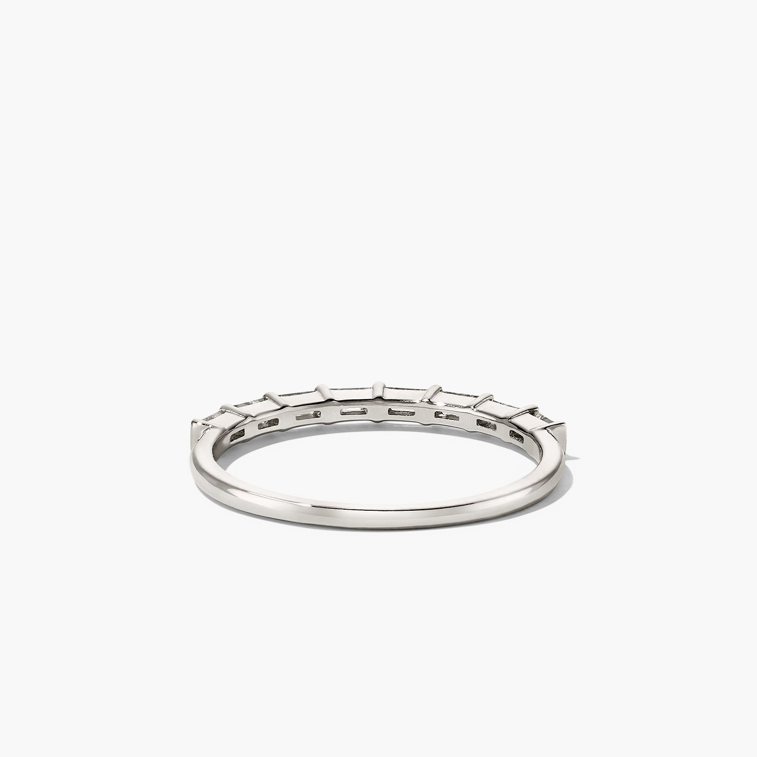 Baguette Diamond Half Eternity Band featuring eight baguette-cut diamonds set in a sleek silver band, highlighting its elegance and timeless design.