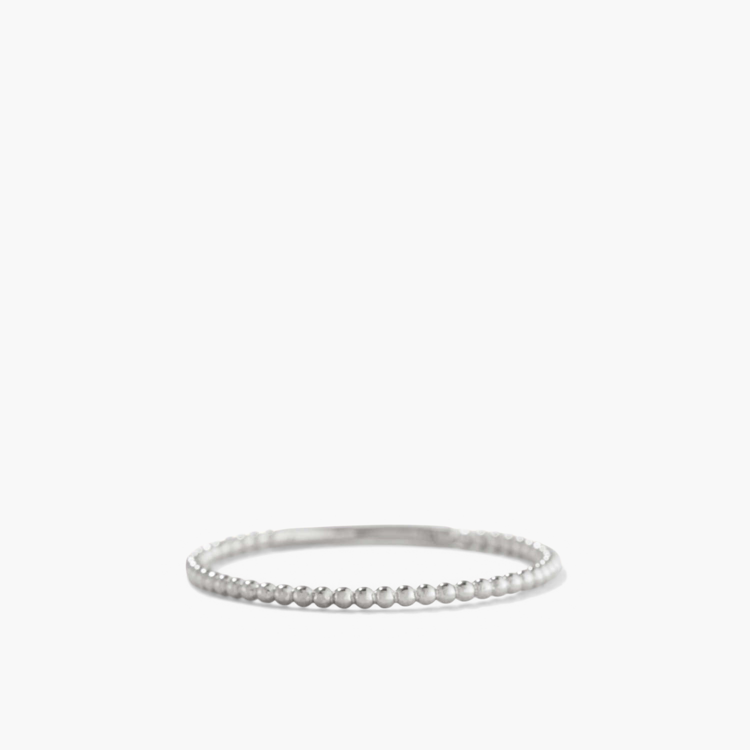 Beaded Ring: Handcrafted 14k white gold ring finished in rhodium plating, featuring small, intricate silver beads. Durable and stylish for everyday wear.