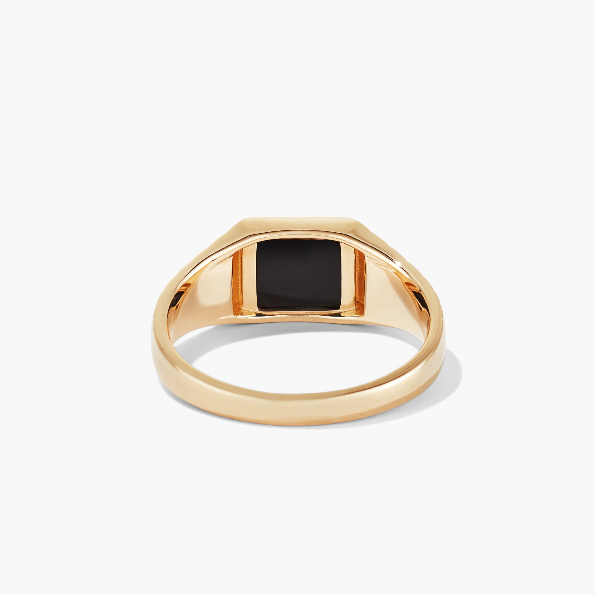 Black Onyx Square Signet Ring featuring a black stone set in a gold band, perfect for a sophisticated and stylish look.