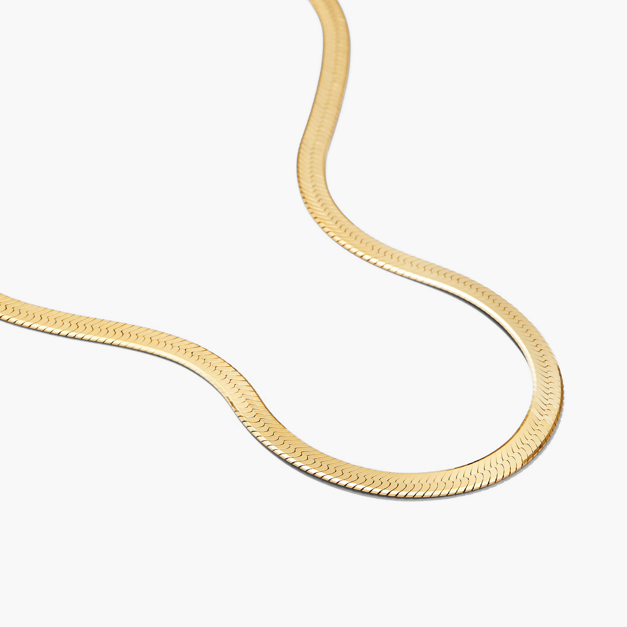 Bold Herringbone Chain Necklace displayed on a white surface, showcasing its intricate design. Available in two lengths for versatile styling.
