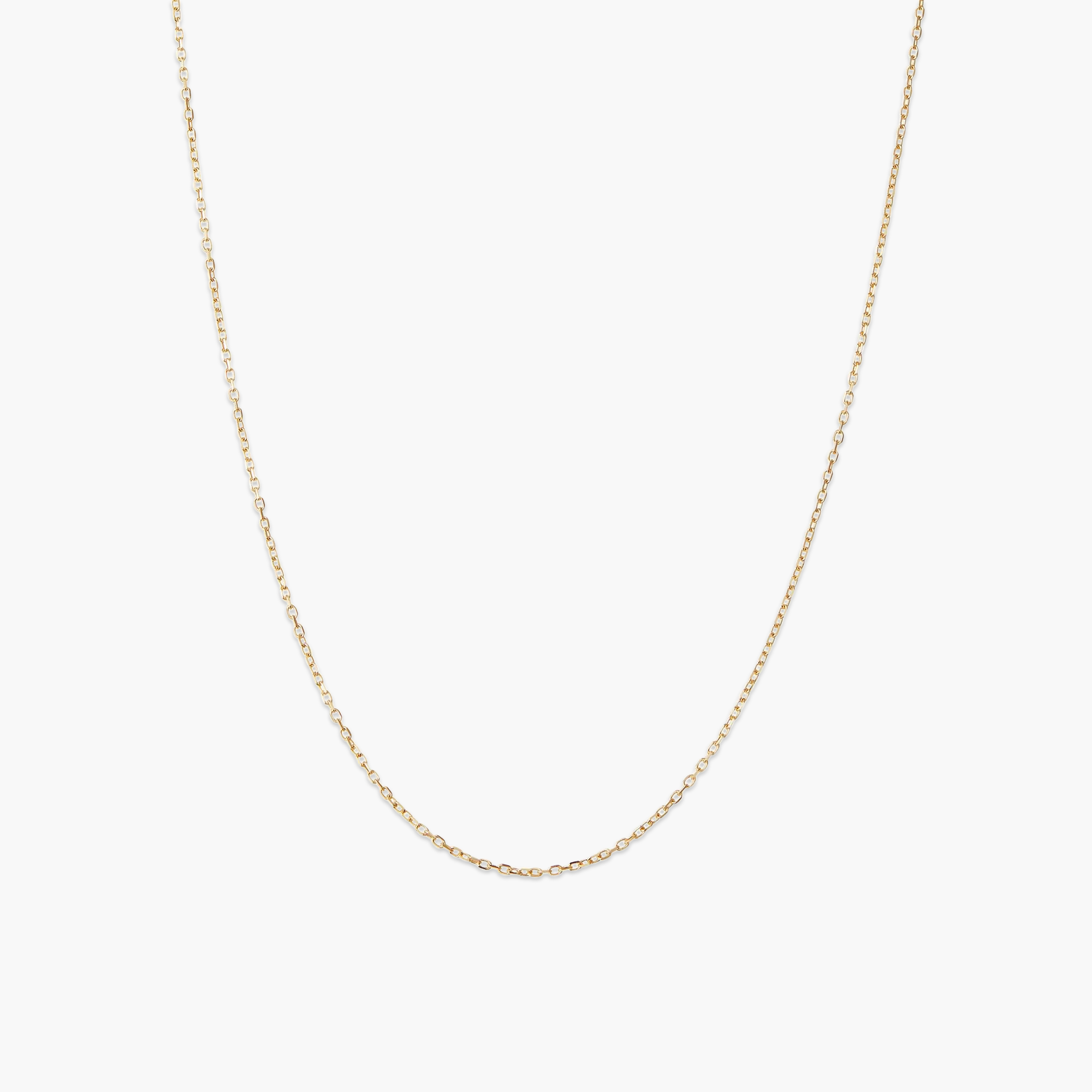 Chain Necklace: A delicate gold chain with small oval links, perfect for adding charms or layering with other necklaces for a minimalist, elegant look.