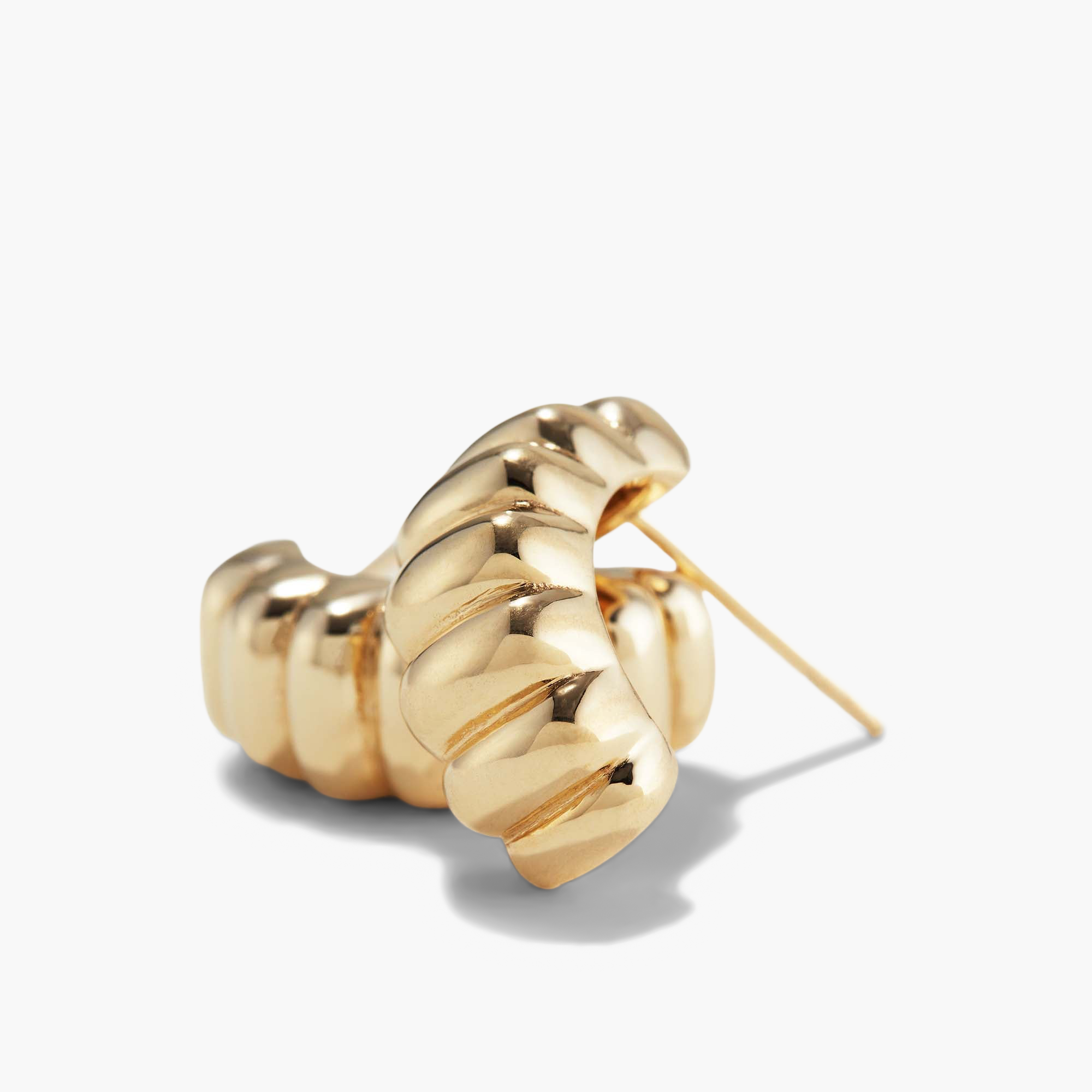 Charlotte Hoops: a pair of intricately designed gold earrings, inspired by the iconic French dessert, perfect for adding elegance to any look.