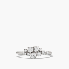 Diamond Cluster Ring with an asymmetric shape, featuring eleven diamonds in prong settings, creating an organic, heirloom-worthy design.