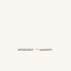 PavÃ© Diamonds Long Bar Studs: Handcrafted 14k gold earrings adorned with diamonds, showcasing a sleek, elongated bar design for an elegant and sophisticated look.