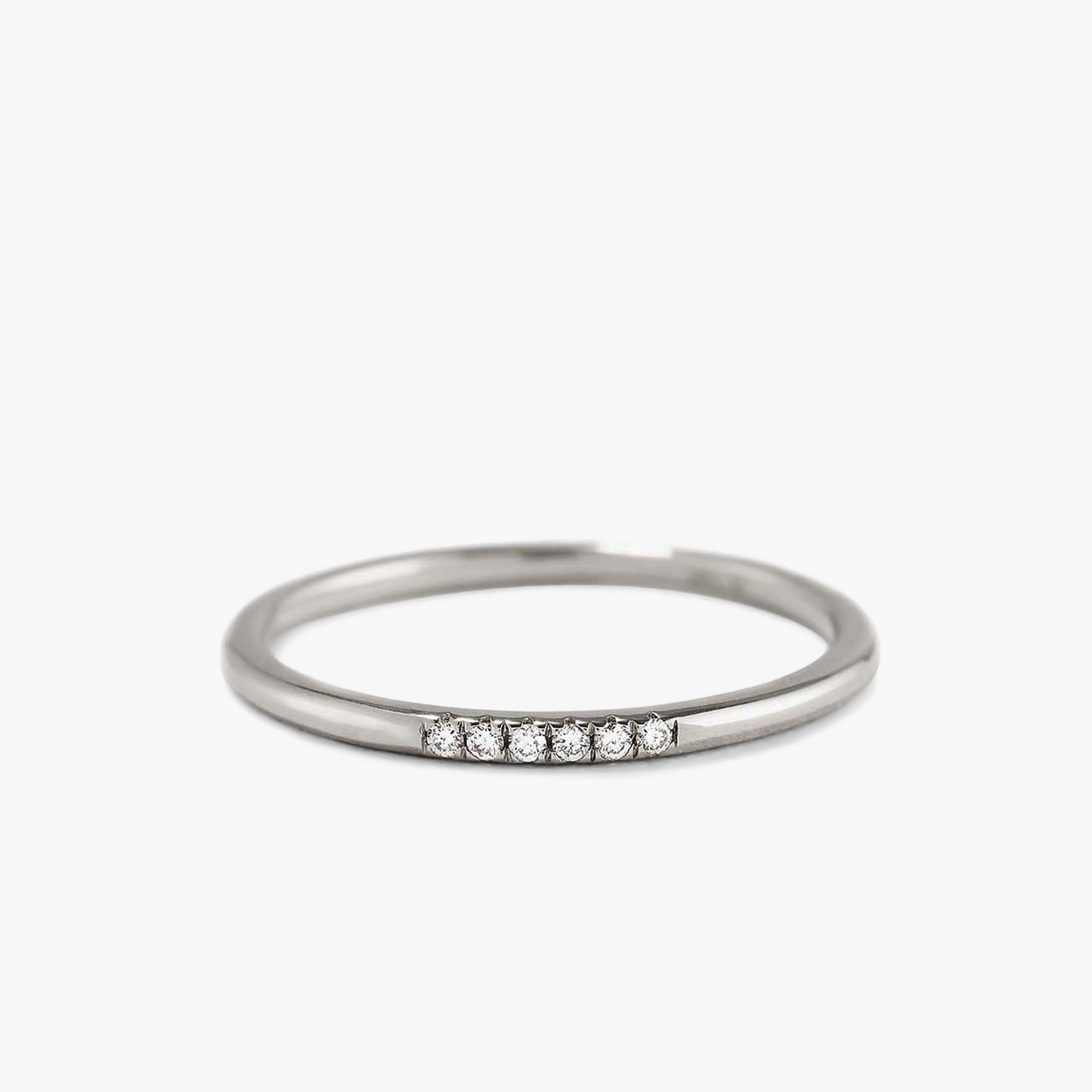 Diamonds Line Ring featuring six responsibly sourced diamonds in a prong setting, enhancing shine. Crafted from 14k solid gold, ideal for stacking or solo wear.