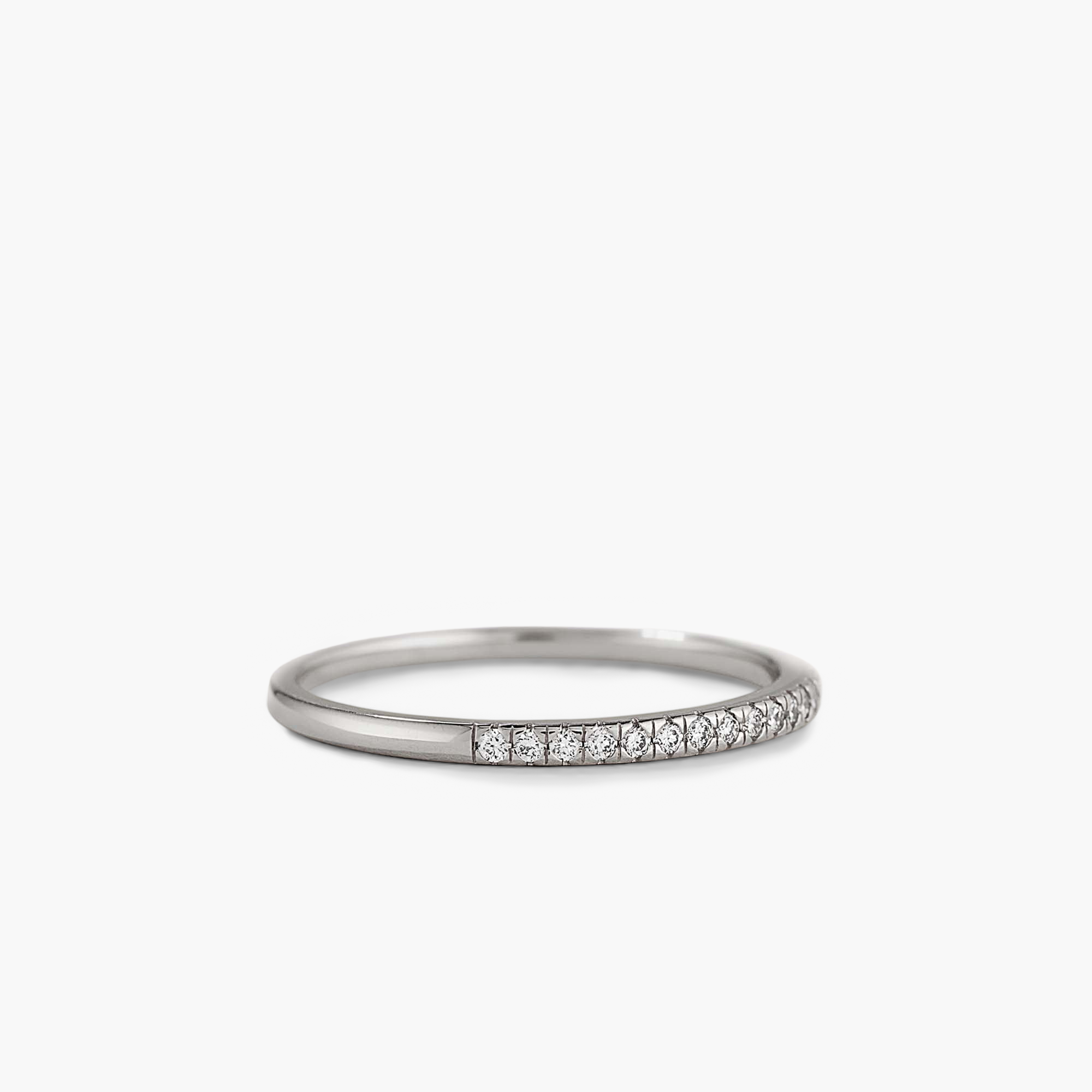 Diamonds Team Ring: A silver ring with diamonds, perfect for pairing with Stacker Rings to elevate any outfit.