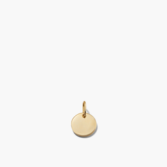 Engravable Charm: A gold circle pendant suitable for customization, shown on a white background. Ideal for personalizing or gifting.