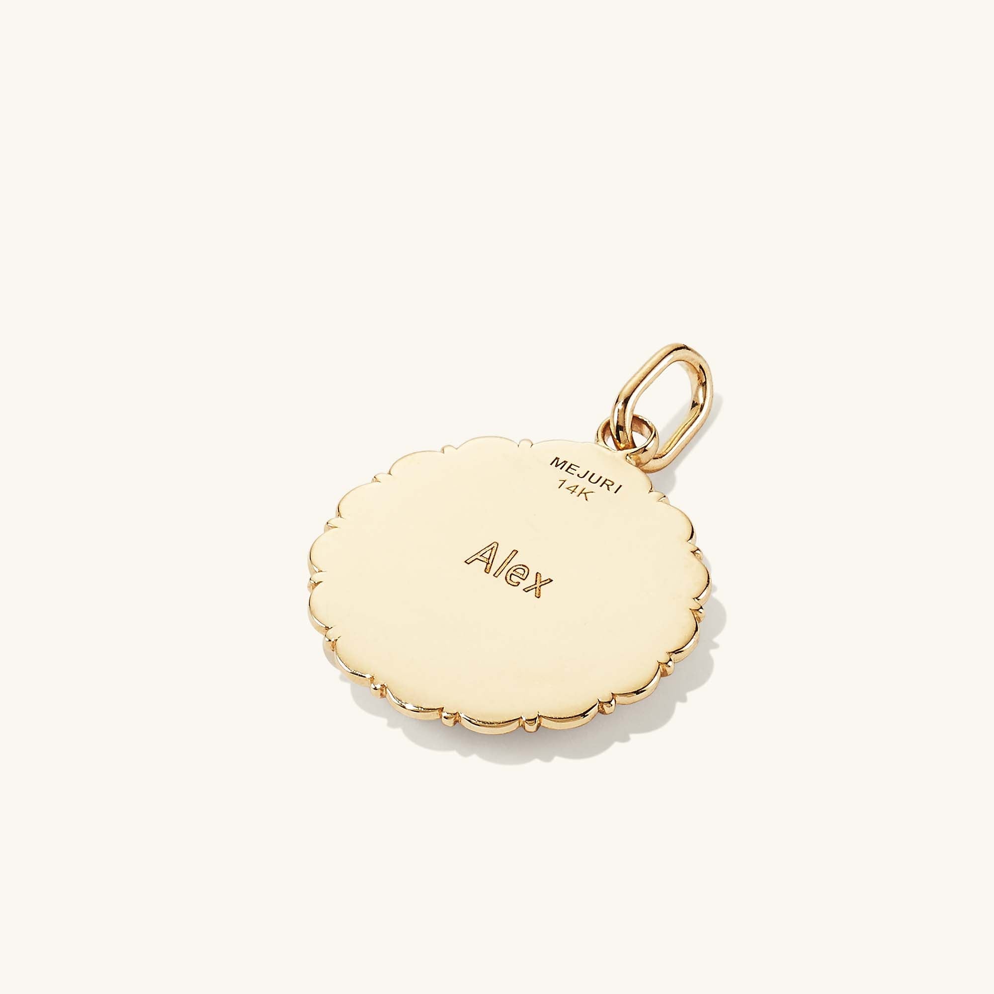 Balance: Terra Coin Charm Pendant depicting the Greek Goddess Gaia, intricately engraved, showcased on a gold chain. Handcrafted in recycled 14k solid gold.