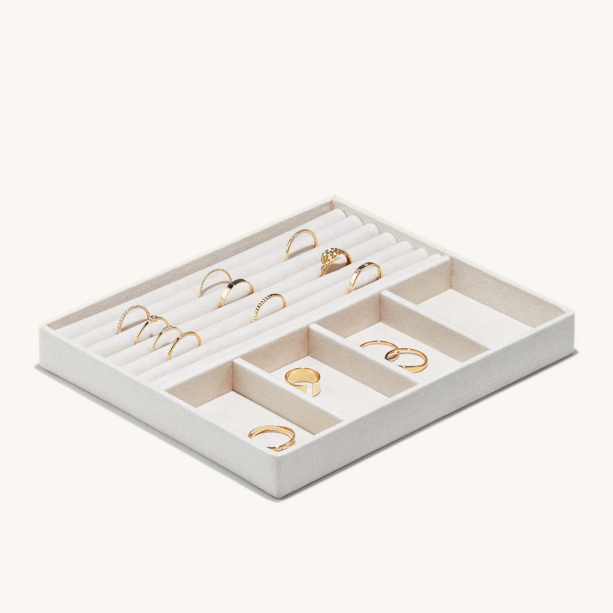 Jewelry Box with gold rings inside, featuring removable trays and compartments for organizing fine jewelry.