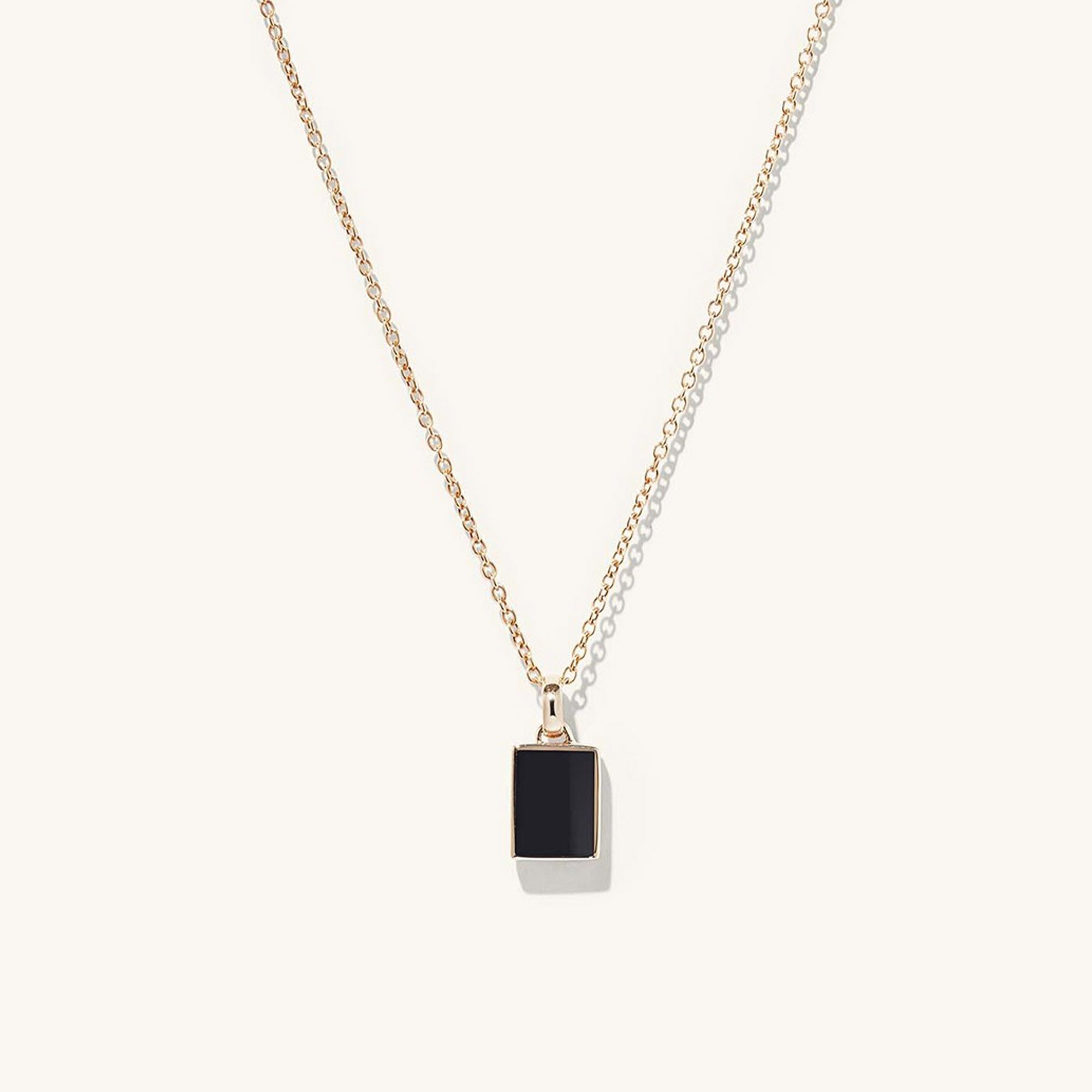 Black Onyx Pendant Necklace featuring a black square pendant on a delicate chain, blending elegance with a strong touch of onyx.