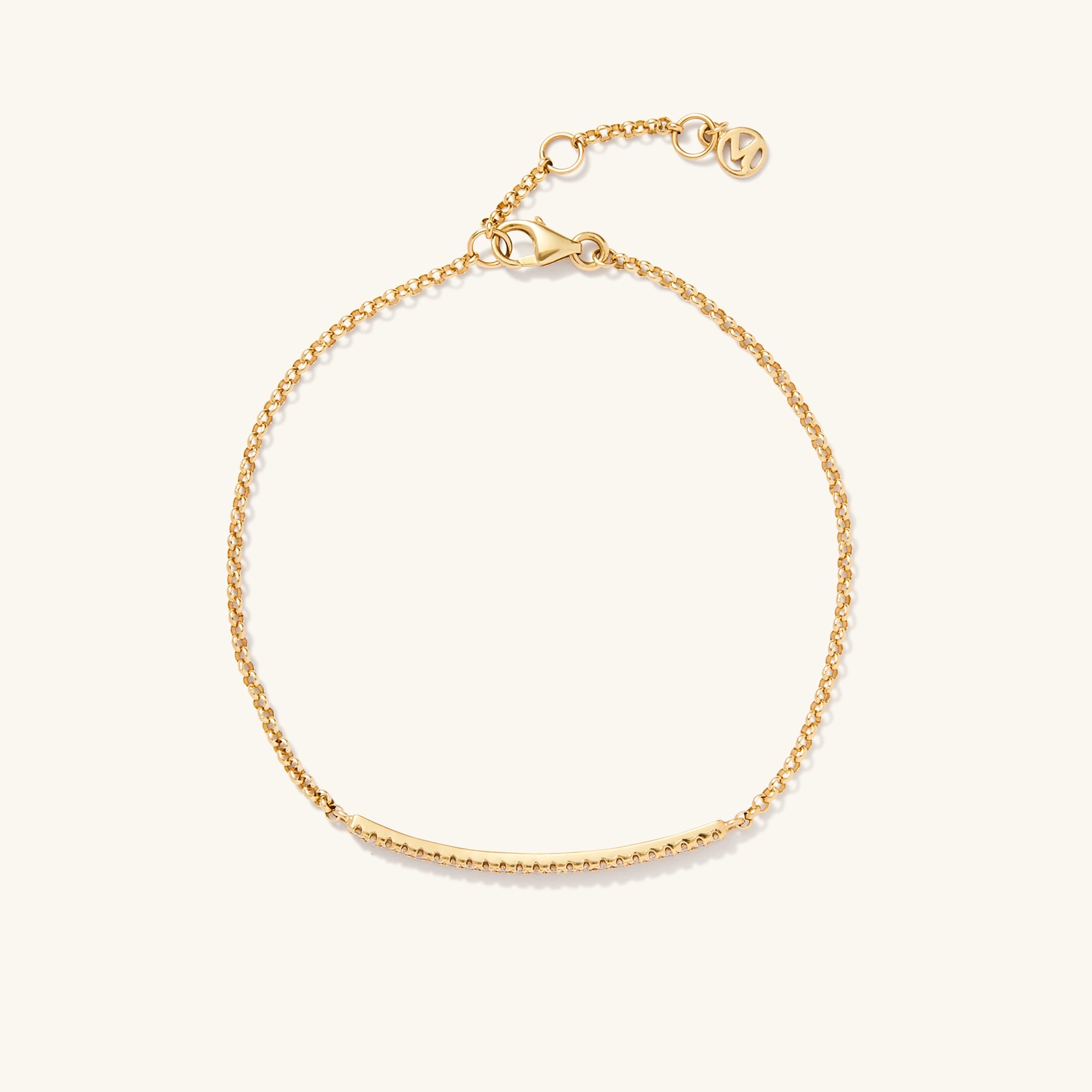 Pave Diamond Bar Bracelet featuring a sleek gold chain and secure clasp, highlighted by a central gold bar adorned with pave diamonds.