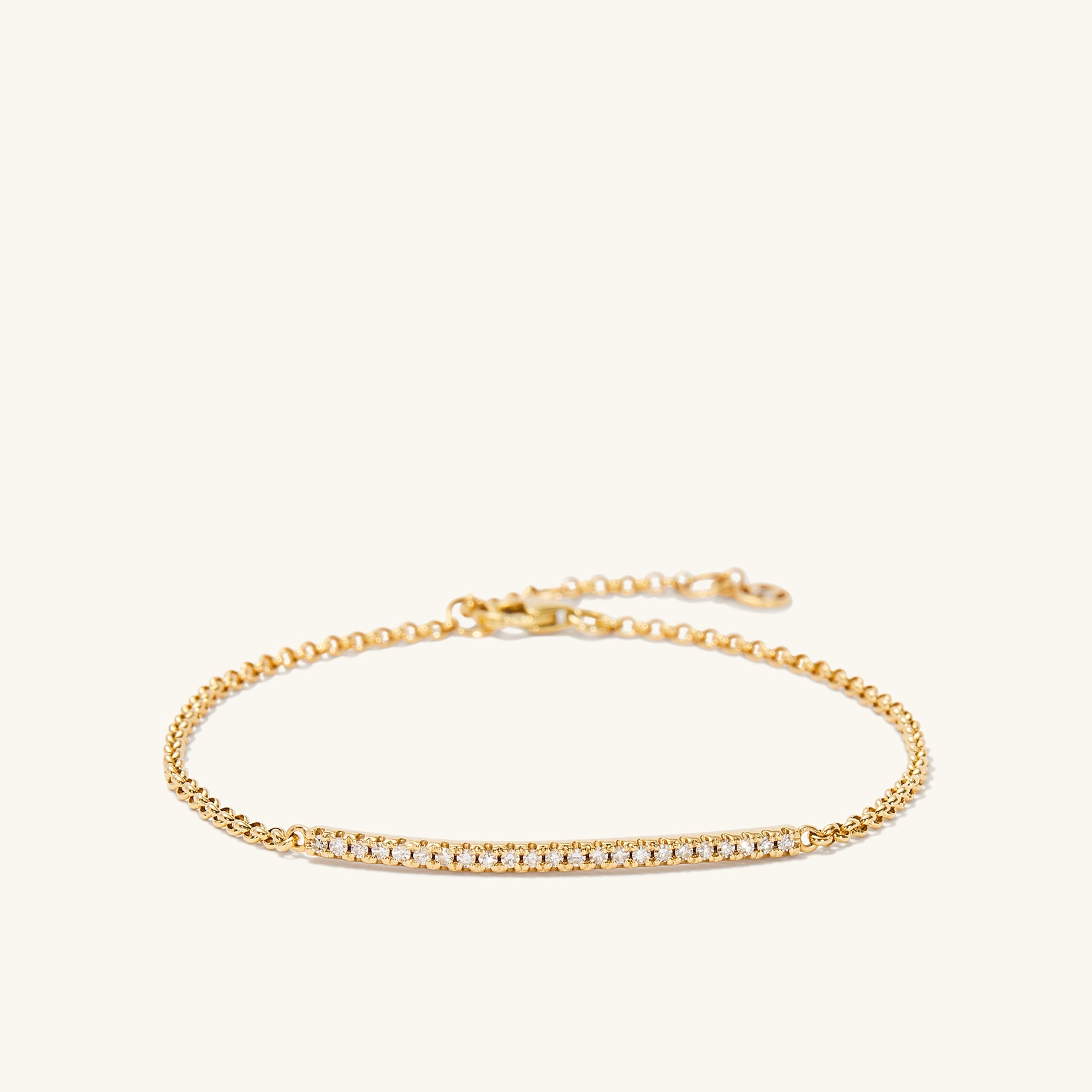 Pave Diamond Bar Bracelet featuring a gold chain adorned with diamonds, exemplifying elegance and sophistication as a fashionable jewelry piece.