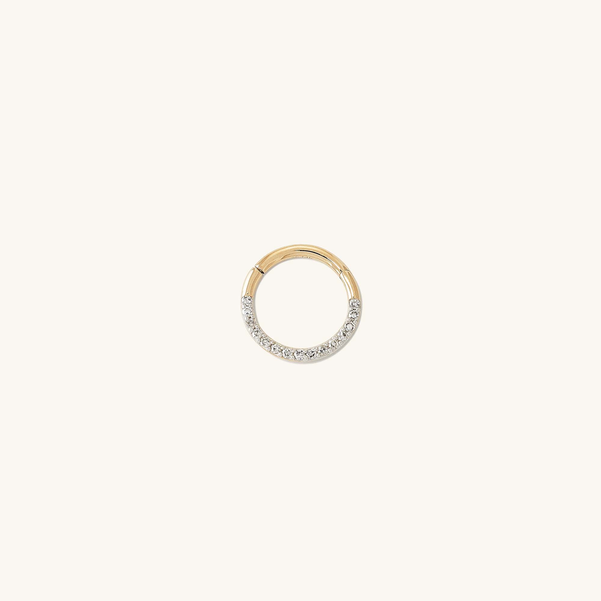 Cartilage PavÃ© Diamond Mini Hoop, a 14k gold ring with pavÃ© diamond setting, designed for the helix, featuring a hinge clasp for easy wear.