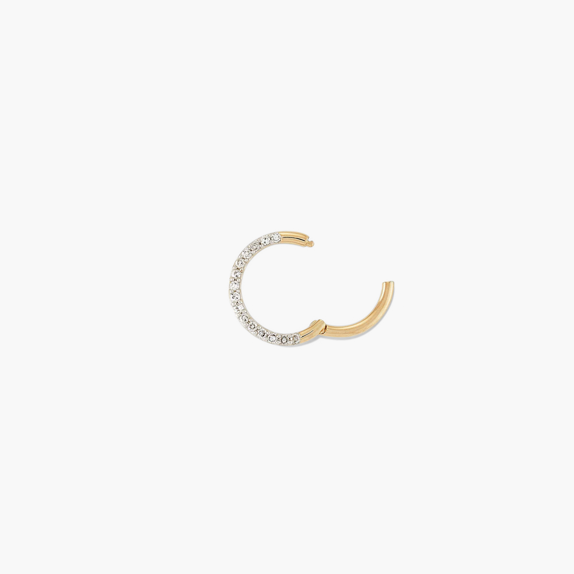 Cartilage PavÃ© Diamond Mini Hoop: A lightweight, handcrafted 14k gold hoop with pavÃ© diamond setting, designed for the helix, featuring an easy hinge clasp. Sold individually.