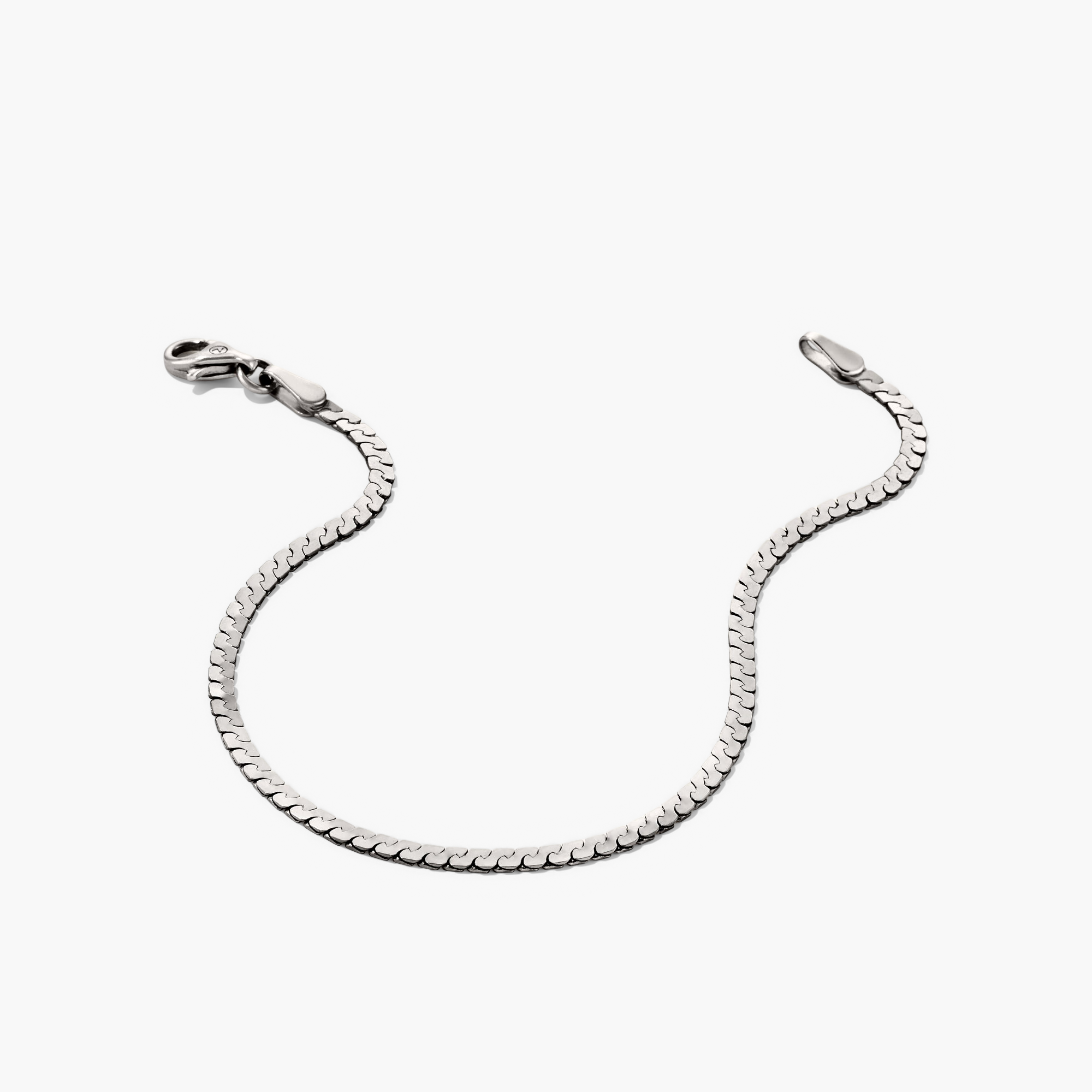 Serpentine Chain Bracelet featuring sleek, flat braided links and a secure clasp. Ideal for comfortable, all-day wear.