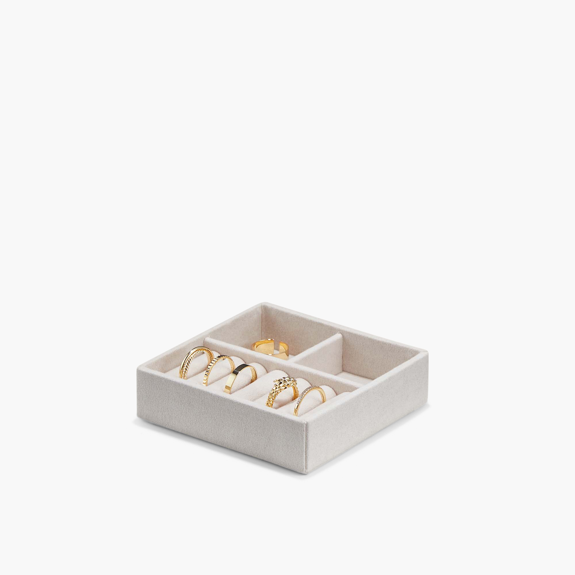 Small Jewelry Box with several gold rings inside, featuring two removable trays and compartments. Interior lining prevents tarnishing.