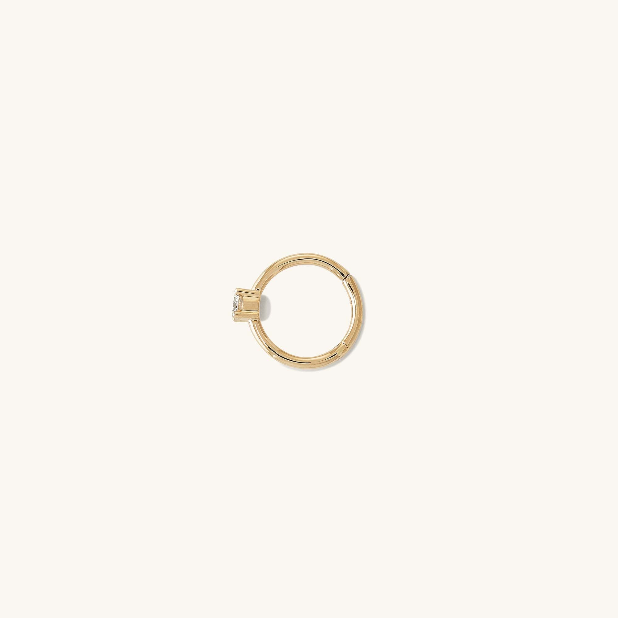 Cartilage Solo Diamond Mini Hoop: A handcrafted 14k gold hoop earring featuring a hinge clasp and a responsibly sourced diamond, designed for helix wear.