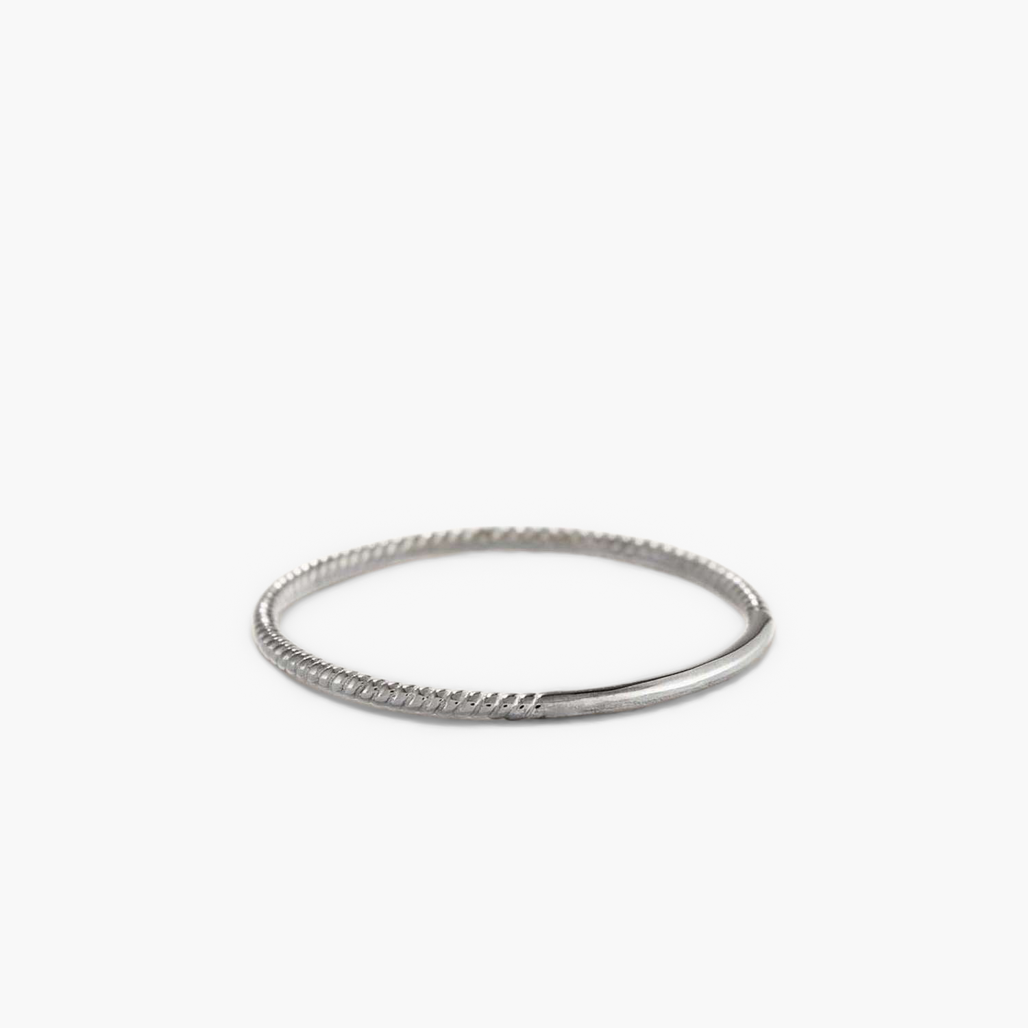 Twist Ring: A silver ring featuring a 1.3 mm band with a delicate twisted pattern, perfect for daily wear.