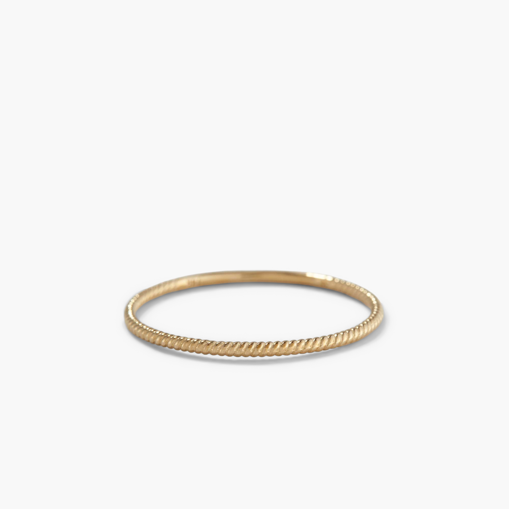 Twist Ring with a 1.3 mm band, featuring a unique twisted pattern for daily wear.