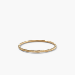 Twist Ring with a 1.3 mm band, featuring a unique twisted pattern for daily wear.