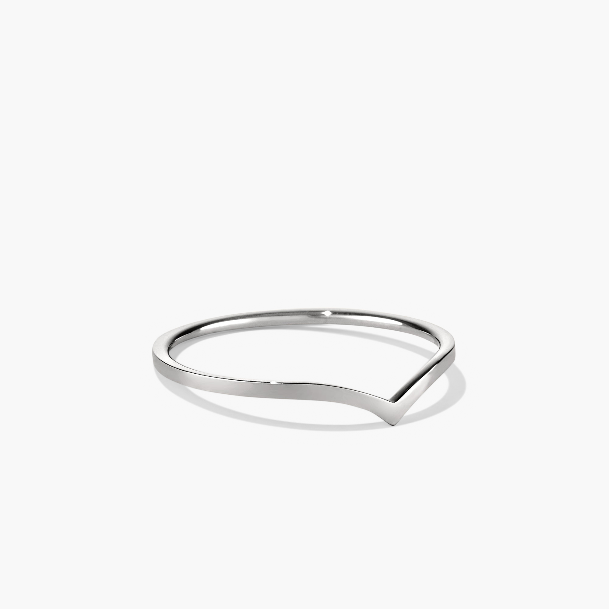Wishbone Stacker Set featuring a silver ring with a curved edge, perfect for layering and bringing good luck charms into everyday wear.